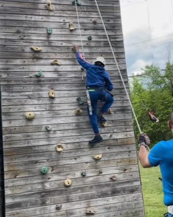 participant rock climbing
